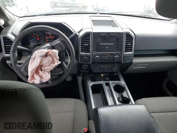 2016 Ford F-150 XLT with VIN 1FTEW1EF7GFD16686, listed as a Copart auction lot 56043975 with 105,709 mi miles and Salvage title. Bid and sale history available at DreamBid. Image 8.