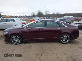 2017 Lincoln MKZ Select z VIN 3LN6L5CC3HR620854, wystawiony jako IAAI lot #41042376 z przebiegiem 131 517 mil mil oraz . Historia ofert i sprzedaży dostępna na DreamBid. Obrazek 14.