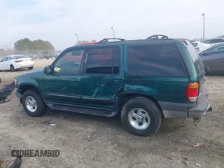 1999 Ford Explorer XLT z VIN 1FMZU32E7XZB57306, wystawiony jako IAAI lot #41519800 z przebiegiem 226 932 mil mil oraz . Historia ofert i sprzedaży dostępna na DreamBid. Obrazek 13.