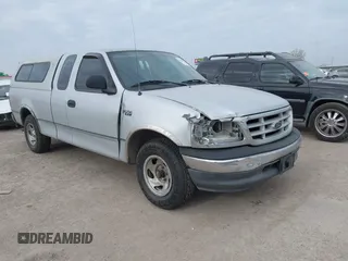 1999 Ford F-150 with VIN 1FTZX1720XKA10512, listed as a IAAI auction lot 41247083 with 169,154 mi miles and . Bid and sale history available at DreamBid. Image 1.