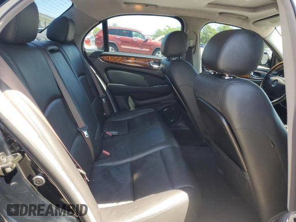 2004 Jaguar XJ с VIN SAJEA73B34TG10749, выставлен на аукционе Copart как лот 56574025 с пробегом 72 240 миль миль и Списание • Salvage title. История ставок и продаж доступна на DreamBid. Изображение 10.