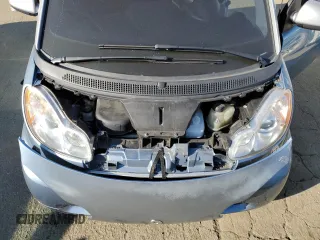 2011 Smart fortwo Pure z VIN WMEEJ3BA1BK431045, wystawiony jako Copart lot #87462044 z przebiegiem 22 128 mil mil oraz Szkoda całkowita • Salvage title. Historia ofert i sprzedaży dostępna na DreamBid. Obrazek 11.