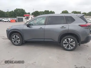 2022 Nissan Rogue SV with VIN 5N1BT3BB8NC695197, listed as a IAAI auction lot 42021604 with 98,091 mi miles and . Bid and sale history available at DreamBid. Image 14.