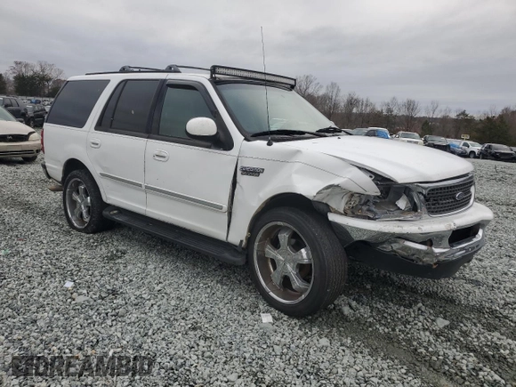 1997 Ford Expedition XLT with VIN 1FMEU17L5VLB80125, listed as a Copart auction lot 83892824 with 257,738 mi miles and Salvage title. Bid and sale history available at DreamBid. Image 4.
