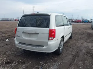 2014 Dodge Grand Caravan SE with VIN 2C4RDGBG9ER283848, listed as a IAAI auction lot 41666021 with 120,351 mi miles and . Bid and sale history available at DreamBid. Image 4.
