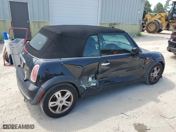 2006 MINI Cooper Convertible with VIN WMWRF33596TG15250, listed as a Copart auction lot 69087234 with 152,716 mi miles and Salvage Title. Bid and sale history available at carsss.com. Image 3.