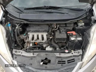 2010 Honda Fit Sport with VIN JHMGE8H40AS023997, listed as a Copart auction lot 53677065 with 105,302 mi miles and Salvage Title. Bid and sale history available at carsss.com. Image 11.