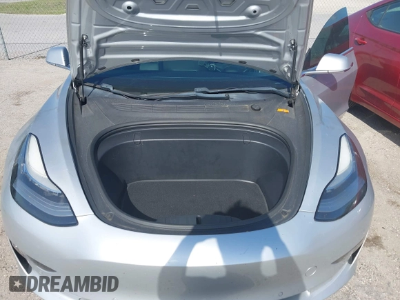 2018 Tesla Model 3 Long Range Battery with VIN 5YJ3E1EB7JF104356, listed as a IAAI auction lot 41936961 with 90,932 mi miles and . Bid and sale history available at DreamBid. Image 10.