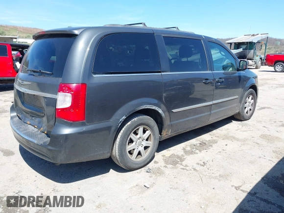 2012 Chrysler Town & Country Touring with VIN 2C4RC1BG9CR313105, listed as a IAAI auction lot 41971919 with 165,986 mi miles. Bid and sale history available at carsss.com. Image 4.