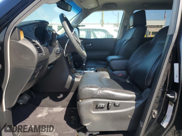 2012 Infiniti QX56 8-passenger with VIN JN8AZ2ND2C9716291, listed as a Copart auction lot 71990704 with 79,241 mi miles and Salvage Title. Bid and sale history available at carsss.com. Image 7.