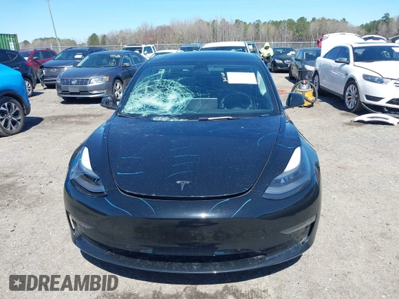 2022 Tesla Model 3 Long Range with VIN 5YJ3E1EB3NF104313, listed as a IAAI auction lot 41832803 with 39,061 mi miles and . Bid and sale history available at DreamBid. Image 12.