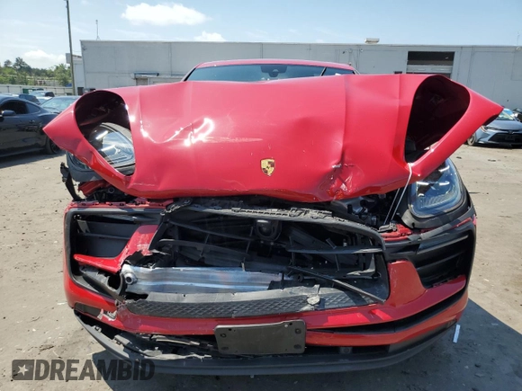 2023 Porsche Macan with VIN WP1AA2A54PLB07597, listed as a Copart auction lot 64077345 with 50,704 mi miles and Salvage title. Bid and sale history available at DreamBid. Image 5.