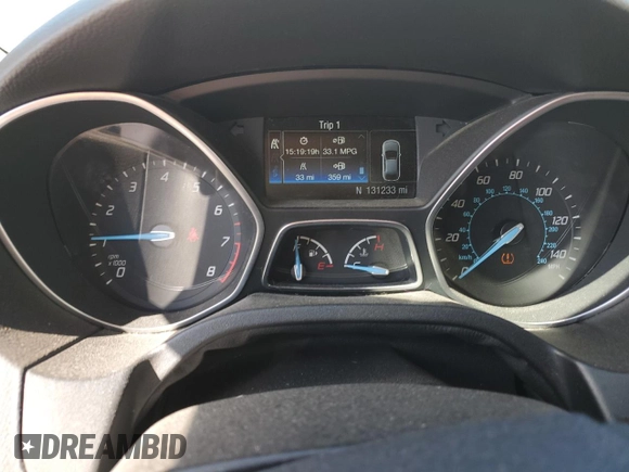 2014 Ford Focus Titanium with VIN 1FADP3J26EL132223, listed as a Copart auction lot 71490004 with 131,233 mi miles and Salvage Title. Bid and sale history available at DreamBid. Image 9.