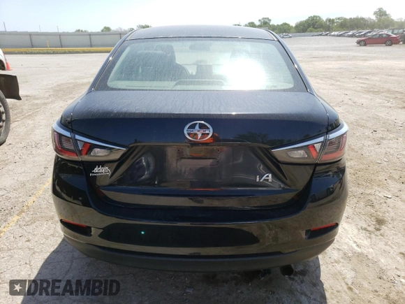 2016 Scion iA z VIN 3MYDLBZV8GY112646, wystawiony jako Copart lot #51481723 z przebiegiem 98 781 mil mil oraz . Historia ofert i sprzedaży dostępna na DreamBid. Obrazek 6.