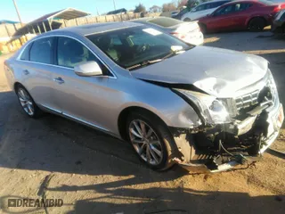 2014 Cadillac XTS Luxury with VIN 2G61M5S30E9187222, listed as a IAAI auction lot 41842676 with 113,594 mi miles. Bid and sale history available at carsss.com. Image 1.