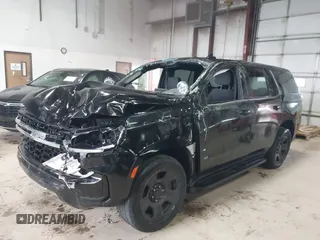 2023 Chevrolet Tahoe Commercial with VIN 1GNSKLED9PR283866, listed as a IAAI auction lot 41908799 with 35,753 mi miles and . Bid and sale history available at DreamBid. Image 2.