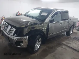 2006 Nissan Titan LE z VIN 1N6BA07B26N572273, wystawiony jako IAAI lot #41252390 z przebiegiem 88 457 mil mil oraz . Historia ofert i sprzedaży dostępna na DreamBid. Obrazek 19.