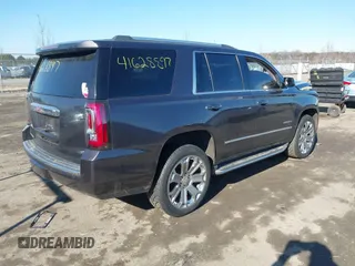 2016 GMC Yukon Denali with VIN 1GKS2CKJ0GR252965, listed as a IAAI auction lot 41628897 with 109,828 mi miles. Bid and sale history available at carsss.com. Image 4.