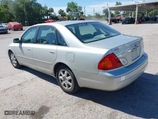 2000 Toyota Avalon XL with VIN 4T1BF28B4YU080945, listed as a IAAI auction lot 42035353 with 116,811 mi miles. Bid and sale history available at carsss.com. Image 3.