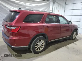2014 Dodge Durango SXT with VIN 1C4RDJAG7EC586540, listed as a Copart auction lot 58769985 with 354,681 mi miles and Salvage title. Bid and sale history available at DreamBid. Image 3.