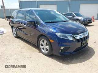 2019 Honda Odyssey EX-L z VIN 5FNRL6H74KB126465, wystawiony jako IAAI lot #42537612 z przebiegiem 88 924 mil mil oraz . Historia ofert i sprzedaży dostępna na DreamBid. Obrazek 1.