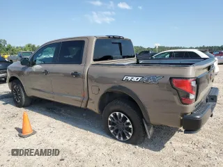 2021 Nissan Titan Pro-4X с VIN 1N6AA1ED2MN533749, выставлен на аукционе Copart как лот 54659655 с пробегом Не указан миль и Списание • Salvage title. История ставок и продаж доступна на DreamBid. Изображение 2.