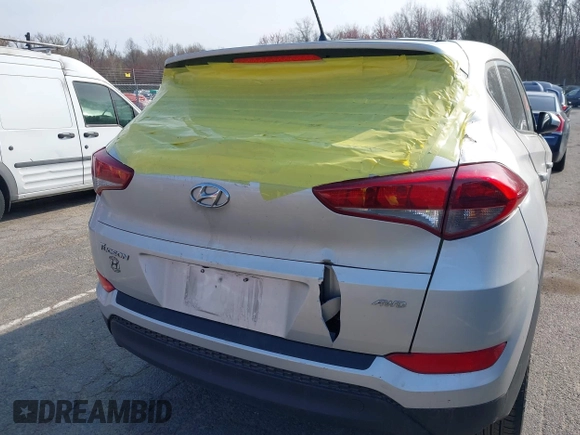 2018 Hyundai Tucson SE z VIN KM8J2CA44JU644303, wystawiony jako IAAI lot #42059326 z przebiegiem 67 873 mil mil oraz . Historia ofert i sprzedaży dostępna na DreamBid. Obrazek 6.