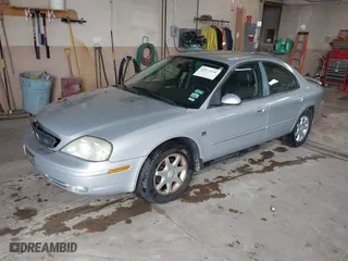 2003 Mercury Sable LS Premium with VIN 1MEFM55S63G621064, listed as a IAAI auction lot 42099656 with 182,862 mi miles. Bid and sale history available at carsss.com. Image 2.
