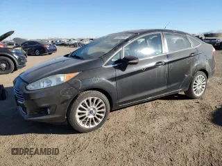 2015 Ford Fiesta Titanium with VIN 3FADP4CJ8FM184110, listed as a Copart auction lot 87863285 with 133,268 mi miles and Salvage Title. Bid and sale history available at carsss.com. Image 1.