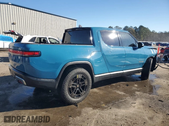 2022 Rivian R1T Launch Edition z VIN 7FCTGAAL7NN000539, wystawiony jako Copart lot #87811245 z przebiegiem Nie podano mil oraz Szkody całkowita. Historia ofert i sprzedaży dostępna na DreamBid. Obrazek 3.