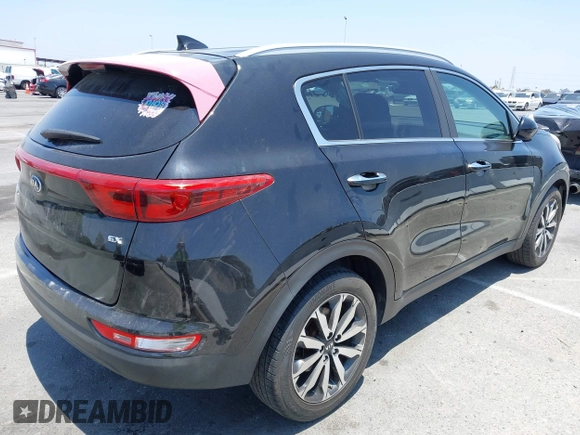 2017 Kia Sportage EX z VIN KNDPN3AC1H7242955, wystawiony jako IAAI lot #42473072 z przebiegiem 112 038 mil mil oraz . Historia ofert i sprzedaży dostępna na DreamBid. Obrazek 4.