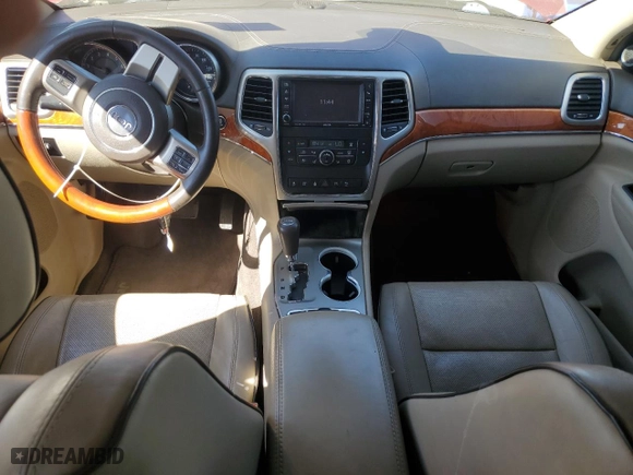 2012 Jeep Grand Cherokee Overland with VIN 1C4RJFCT4CC250602, listed as a Copart auction lot 49503905 with 149,016 mi miles and Salvage Title. Bid and sale history available at carsss.com. Image 8.