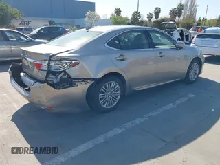 2015 Lexus ES with VIN JTHBK1GG3F2196961, listed as a IAAI auction lot 42003591 with 82,580 mi miles. Bid and sale history available at carsss.com. Image 4.
