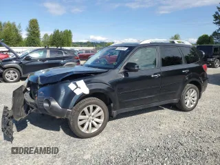 2011 Subaru Forester X Touring with VIN JF2SHAHC3BH779258, listed as a Copart auction lot 63585345 with 136,813 mi miles and Salvage title. Bid and sale history available at DreamBid. Image 1.
