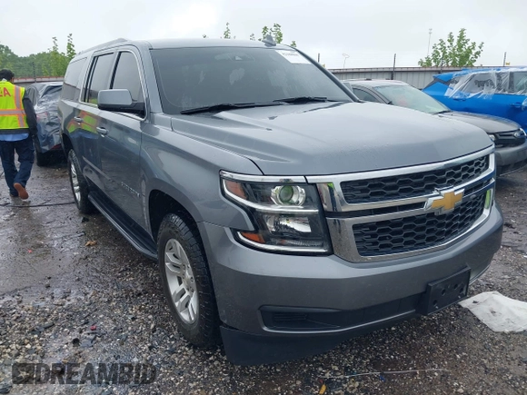 2019 Chevrolet Suburban LT with VIN 1GNSKHKCXKR405555, listed as a IAAI auction lot 42188860 with 143,435 mi miles and . Bid and sale history available at DreamBid. Image 1.