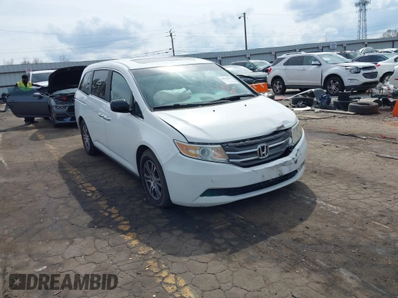 2011 Honda Odyssey EX-L with VIN 5FNRL5H67BB070541, listed as a IAAI auction lot 41812554 with 150,898 mi miles and . Bid and sale history available at DreamBid. Image 1.