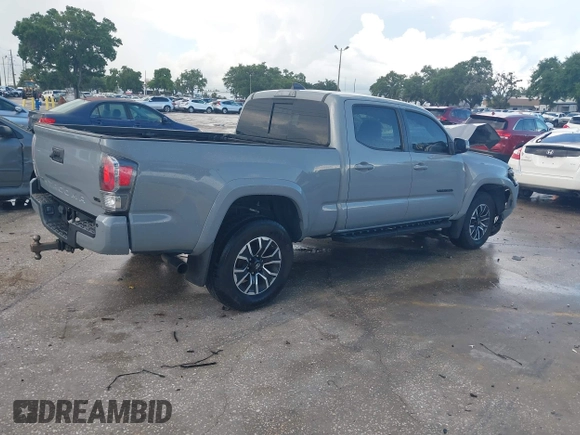 2020 Toyota Tacoma SR5 with VIN 3TMDZ5BN3LM080702, listed as a IAAI auction lot 42463811 with 70,185 mi miles and . Bid and sale history available at DreamBid. Image 4.