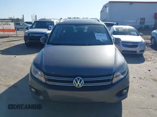 2012 Volkswagen Tiguan SE with VIN WVGAV7AX5CW000275, listed as a IAAI auction lot 41789246 with 123,618 mi miles and . Bid and sale history available at DreamBid. Image 6.