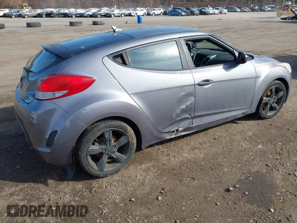 2013 Hyundai Veloster w/Black Int with VIN KMHTC6AD5DU172964, listed as a IAAI auction lot 41768827 with 102,782 mi miles and . Bid and sale history available at DreamBid. Image 4.