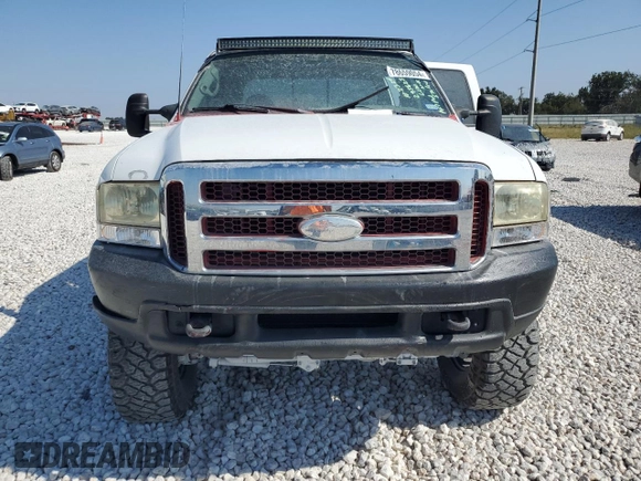 2000 Ford Super Duty F-250 XL with VIN 1FTNW21SXYEA52699, listed as a Copart auction lot 78659054 with 154,056 mi miles and Salvage Title. Bid and sale history available at carsss.com. Image 5.