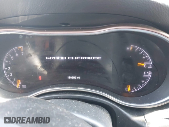 2016 Jeep Grand Cherokee Laredo z VIN 1C4RJFAG2GC454861, wystawiony jako IAAI lot #41964977 z przebiegiem 180 592 mil mil oraz . Historia ofert i sprzedaży dostępna na DreamBid. Obrazek 7.