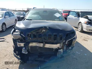 2019 Jeep Cherokee Latitude Plus with VIN 1C4PJLLB4KD312411, listed as a IAAI auction lot 41677041 with 82,802 mi miles and . Bid and sale history available at DreamBid. Image 12.