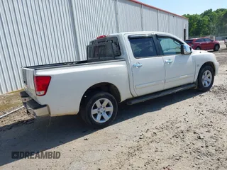 2004 Nissan Titan LE with VIN 1N6AA07AX4N534127, listed as a IAAI auction lot 42048092 with Not Provided miles. Bid and sale history available at carsss.com. Image 4.