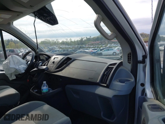 2016 Ford Transit Cargo with VIN 1FTYR1ZM2GKA38963, listed as a IAAI auction lot 42027447 with 70,659 mi miles and . Bid and sale history available at DreamBid. Image 5.