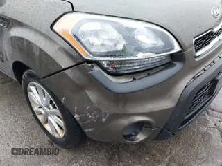2012 Kia Soul + with VIN KNDJT2A67C7426869, listed as a IAAI auction lot 41941698 with 117,815 mi miles. Bid and sale history available at carsss.com. Image 6.
