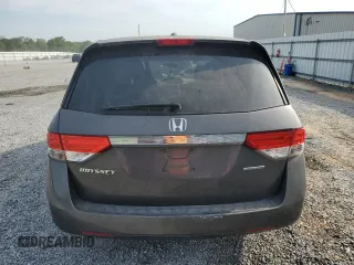 2016 Honda Odyssey SE with VIN 5FNRL5H38GB091380, listed as a Copart auction lot 55408255 with 128,974 mi miles and Salvage Title. Bid and sale history available at DreamBid. Image 6.