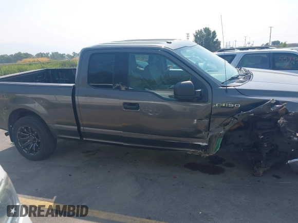2016 Ford F-150 XLT with VIN 1FTEX1E80GKD98282, listed as a IAAI auction lot 40317900 with 159,605 mi miles. Bid and sale history available at carsss.com. Image 13.