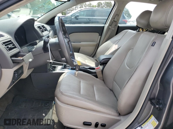 2012 Ford Fusion SEL z VIN 3FAHP0JA4CR371923, wystawiony jako Copart lot #55132125 z przebiegiem 135 390 mil mil oraz Szkody całkowita. Historia ofert i sprzedaży dostępna na DreamBid. Obrazek 7.