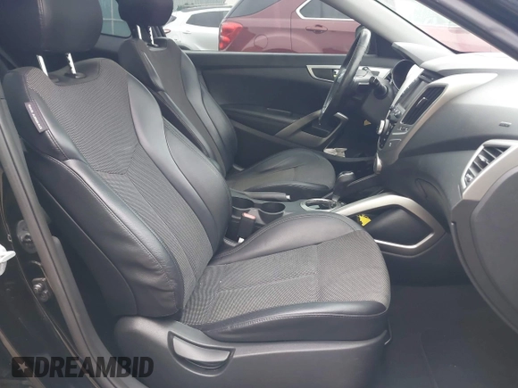 2013 Hyundai Veloster w/Black Int with VIN KMHTC6AD7DU170049, listed as a IAAI auction lot 42441737 with 101,924 mi miles and . Bid and sale history available at DreamBid. Image 5.