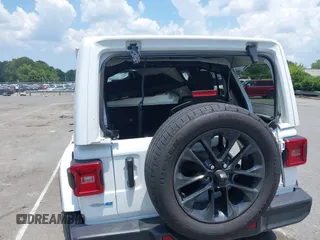 2024 Jeep Wrangler Sahara with VIN 1C4RJXP64RW270463, listed as a IAAI auction lot 42598295 with 36,251 mi miles and . Bid and sale history available at DreamBid. Image 19.